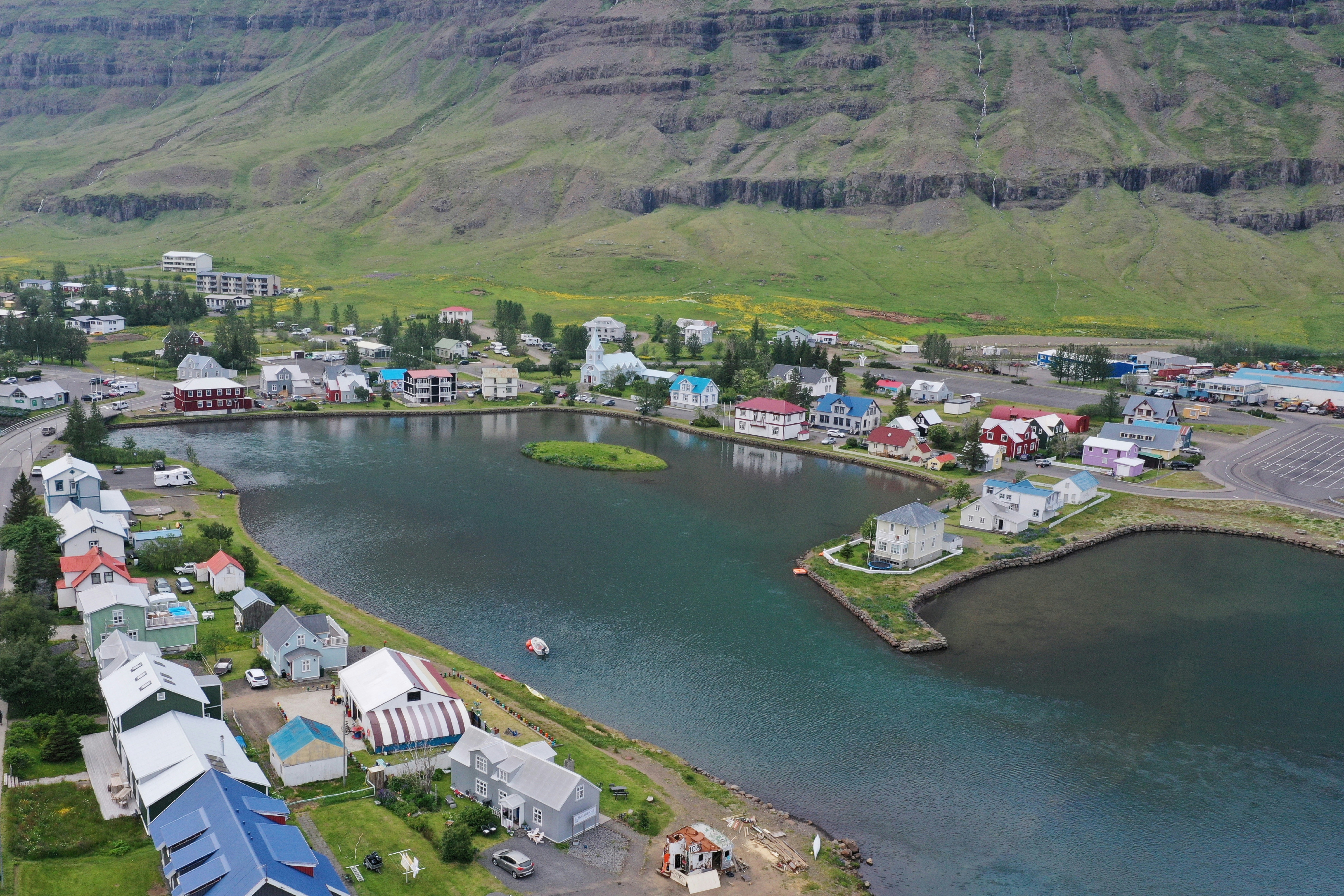 aerial view of city near lake during daytime