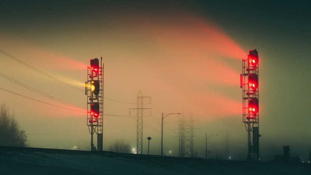 red traffic light during sunset