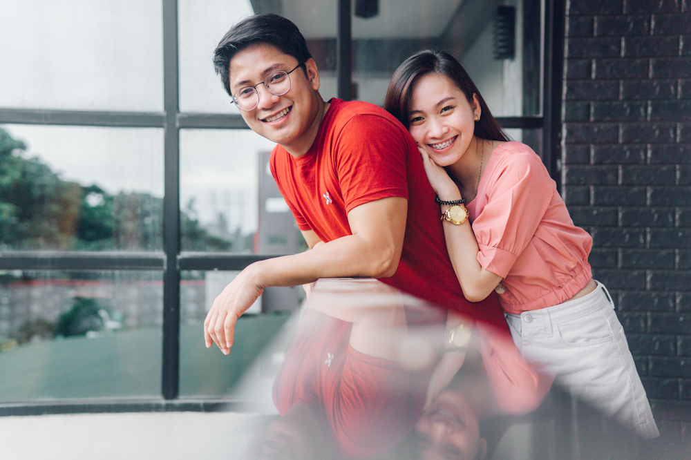 woman in red shirt smiling