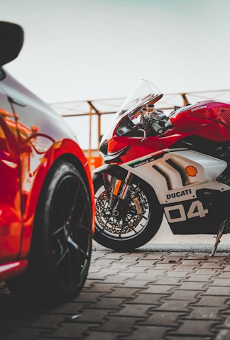 red and black sports bike
