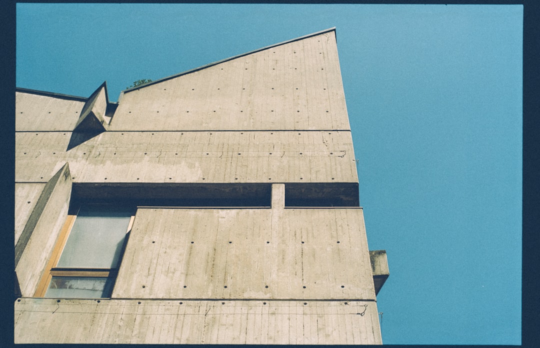 brown wooden wall under blue sky during daytime