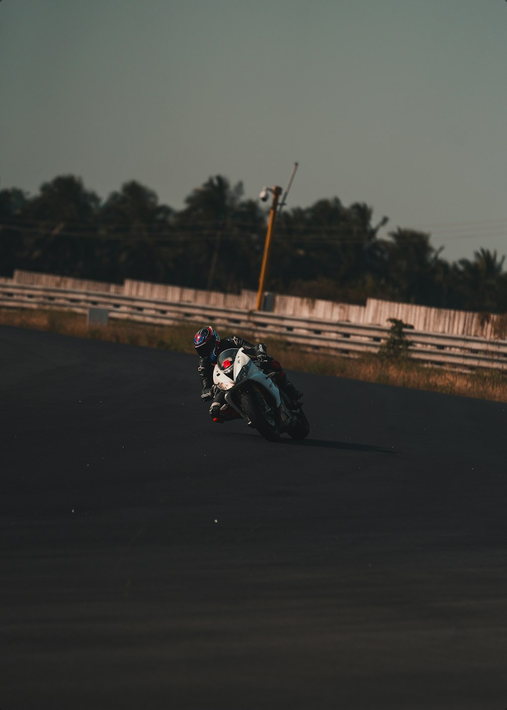 man in black jacket riding motorcycle