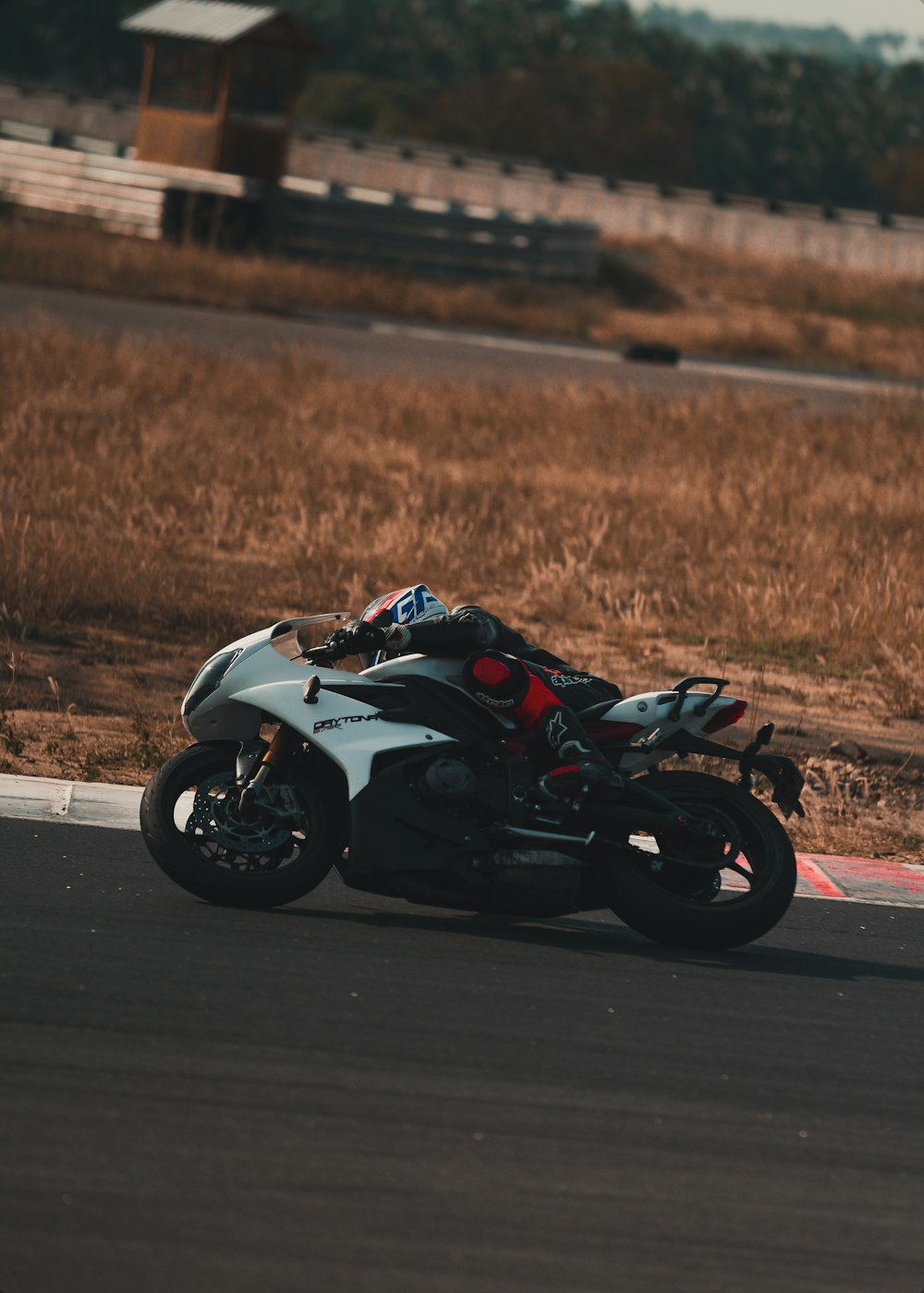 black and white sports bike on road during daytime