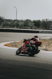 A rider practicing defensive driving techniques on a motorcycle.