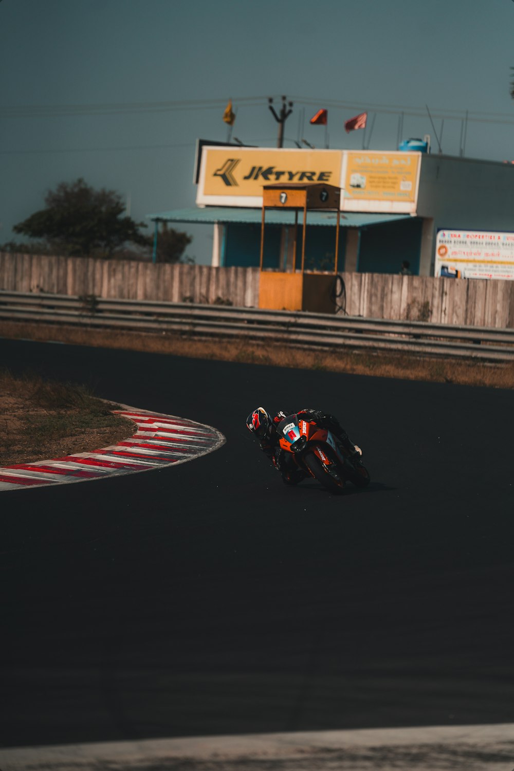 man in black jacket riding motorcycle on road during daytime