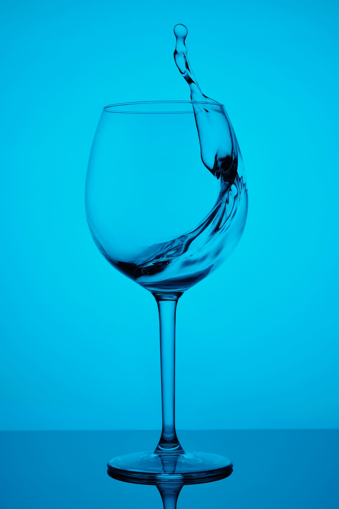 clear wine glass with red wine