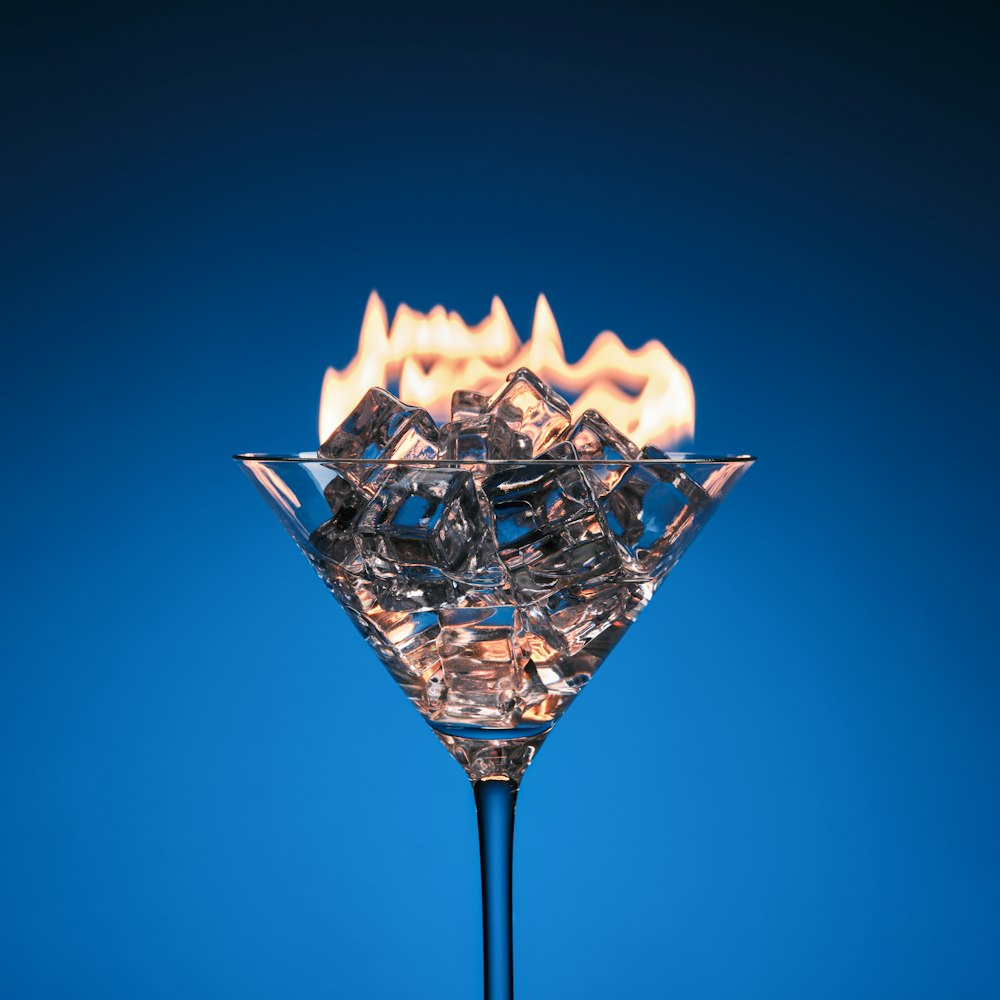 clear wine glass with fire