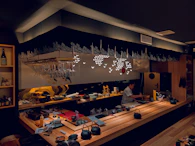 A cozy sushi bar with chefs preparing fresh sushi rolls in a warm, inviting atmosphere.