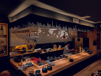 A serene and minimalist sushi bar with a chef preparing fresh sushi by hand.