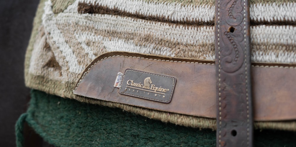 brown and green leather pouch