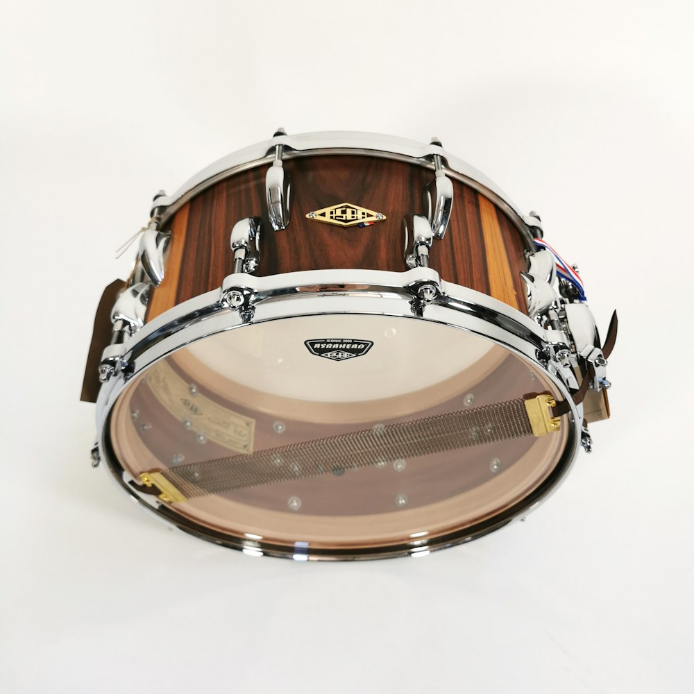 brown and black drum set