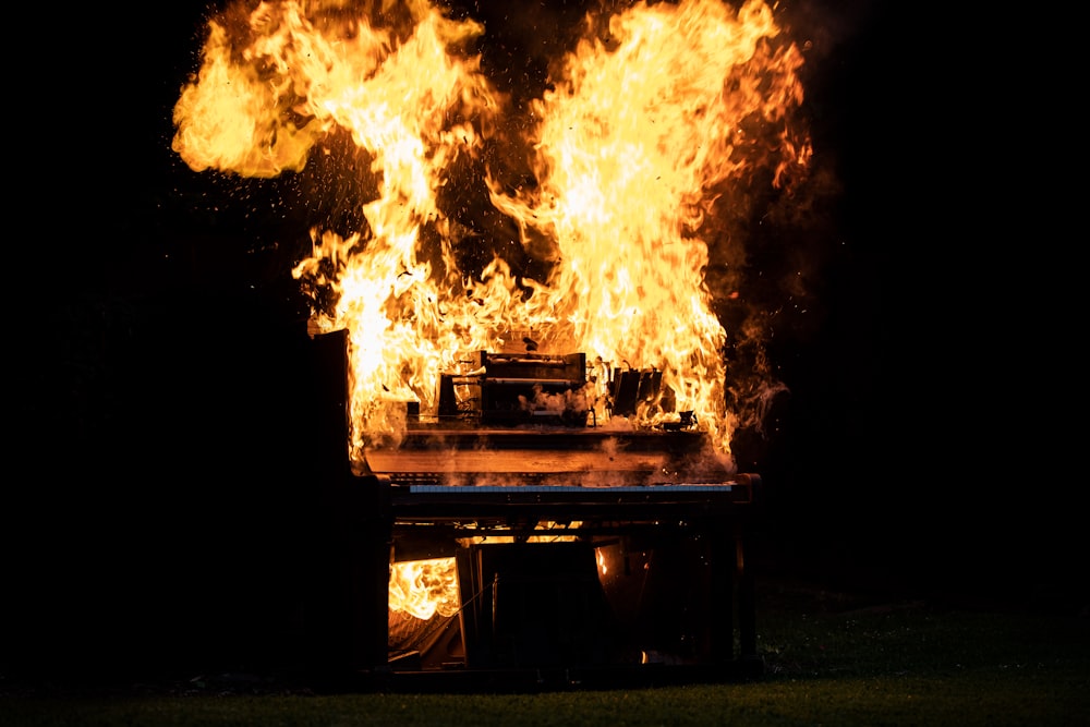 fire on black wooden table