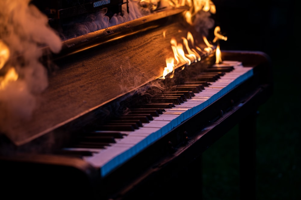 brown upright piano in grayscale photography