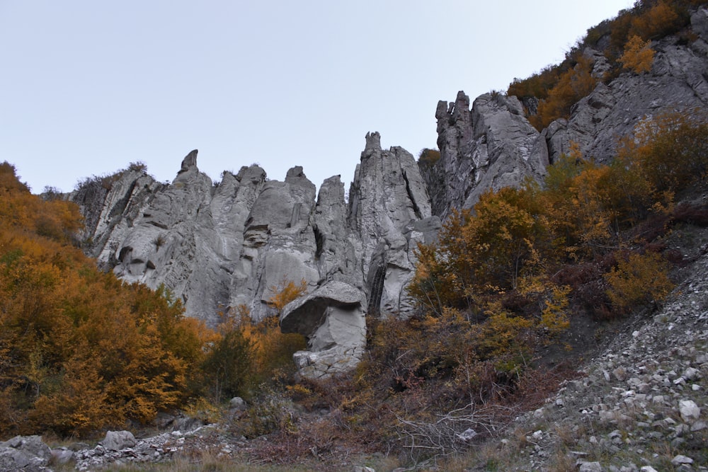 gray rocky mountain under gray sky during daytime