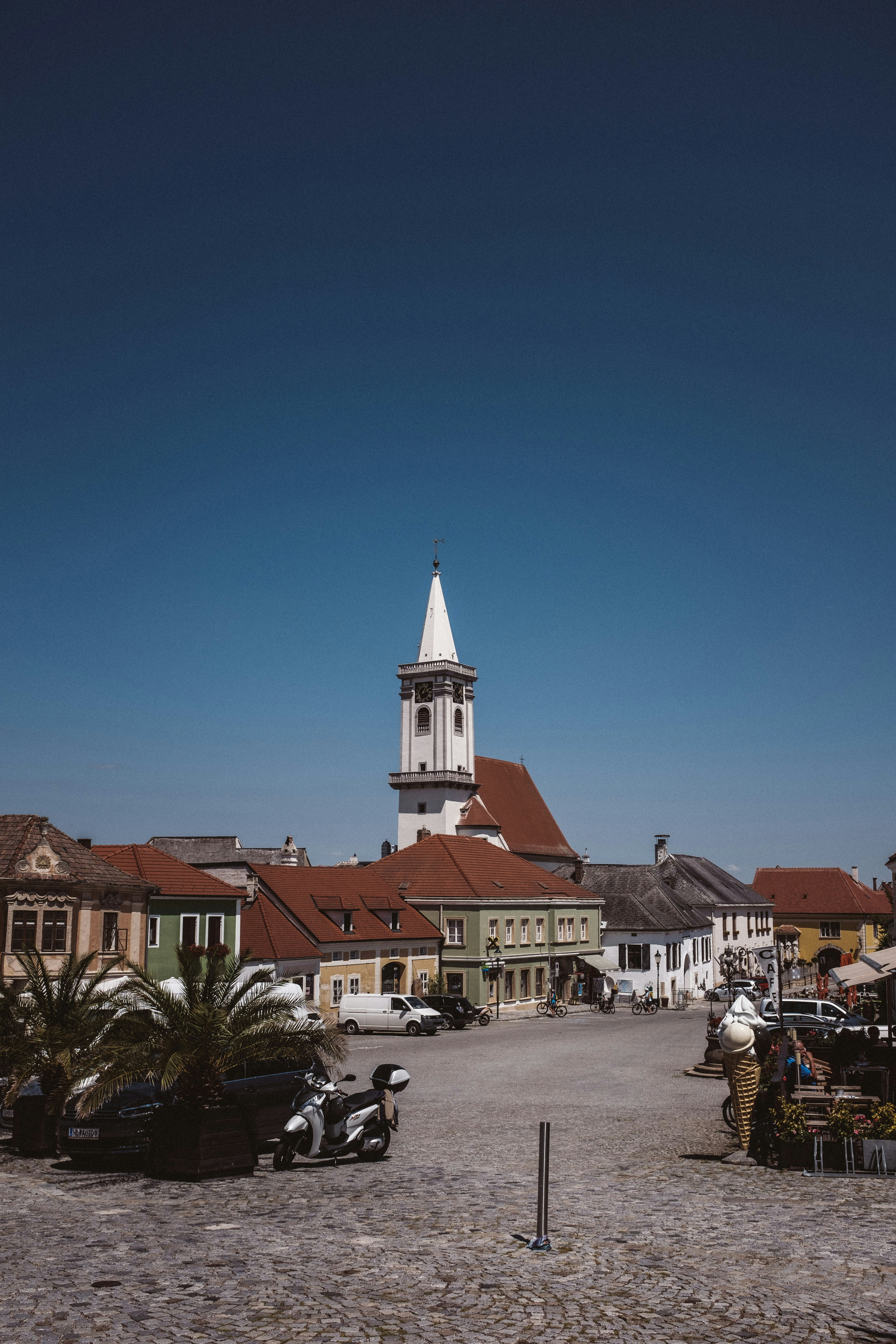 white and brown concrete building under blue sky during daytime
