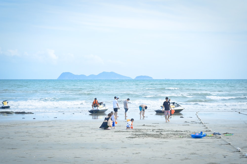 people on beach during daytime