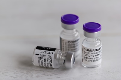 two white and purple bottles