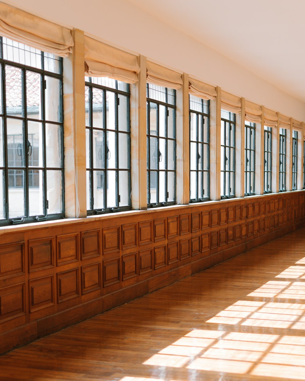 brown wooden framed glass windows