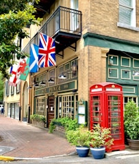A cozy Riverside café decorated with British flags and memorabilia, where fans gather to chat.