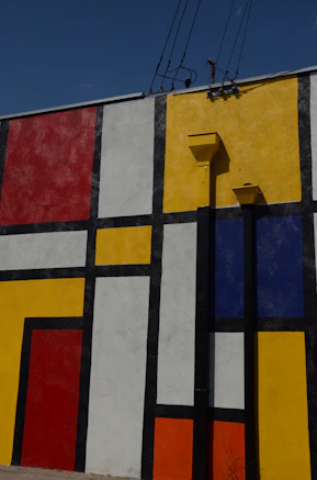 yellow blue red and white wall