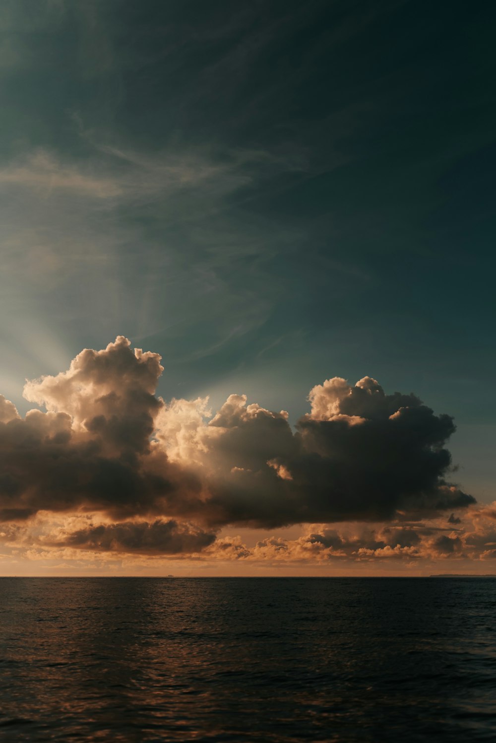 clouds over the sea during sunset