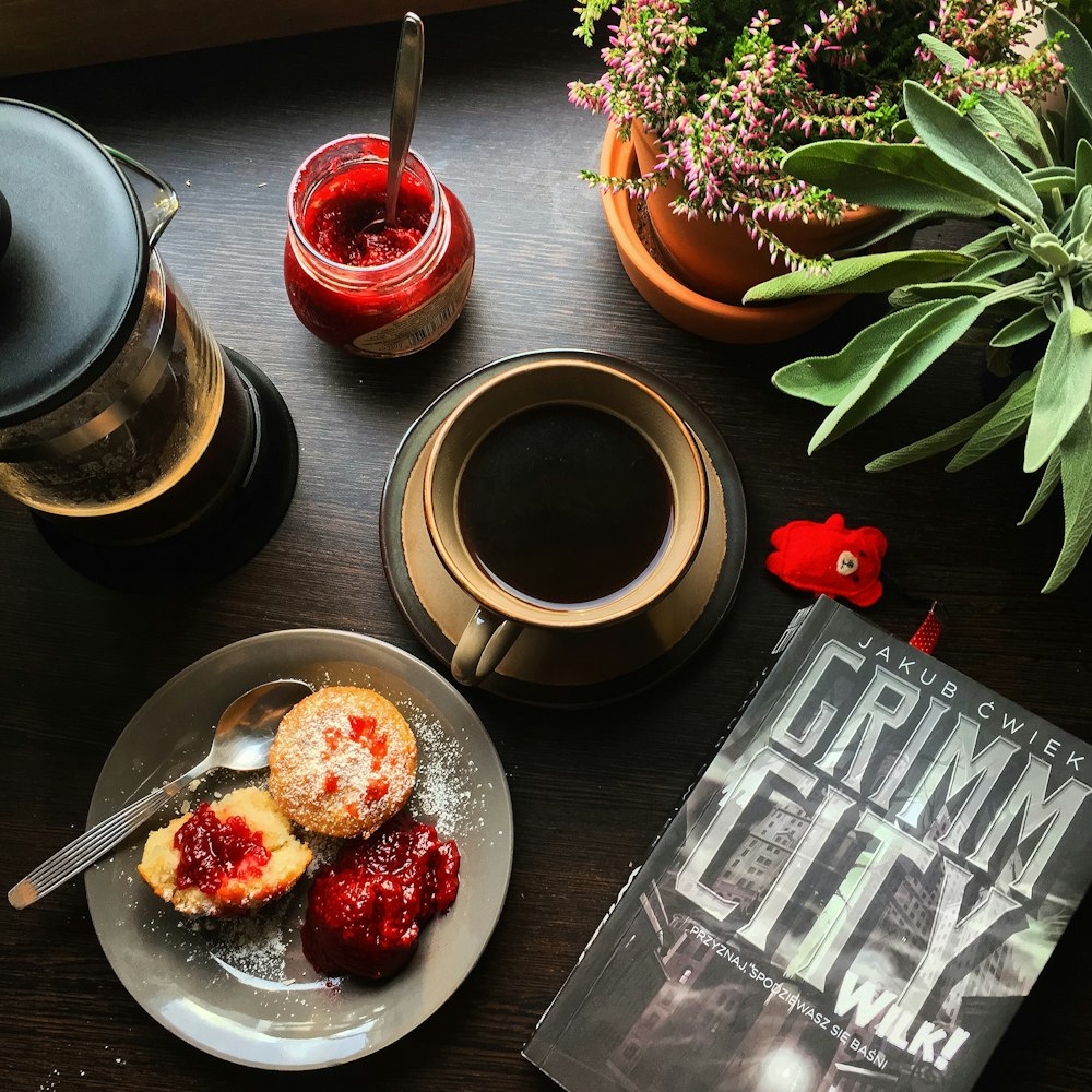 strawberries on black ceramic bowl