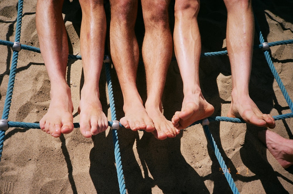 person standing on blue rope