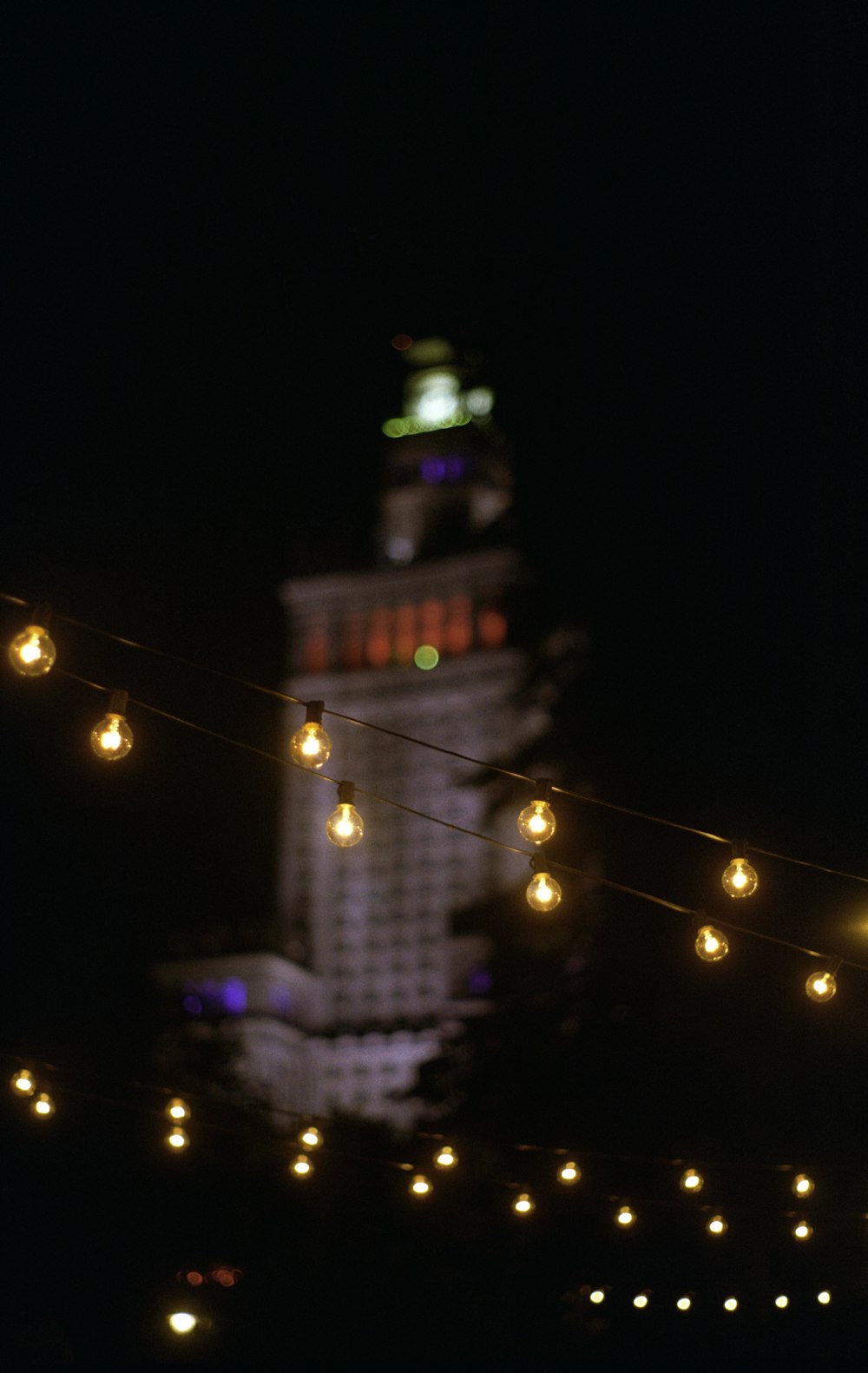 white and brown concrete building during night time