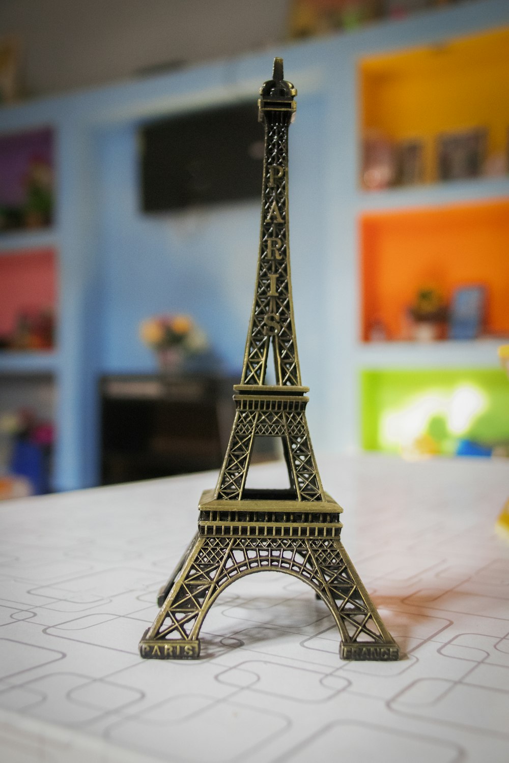 eiffel tower scale model on white paper