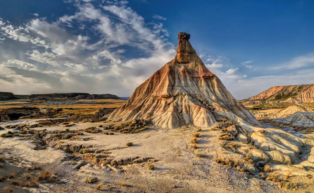 brown rock formation under blue sky during daytime