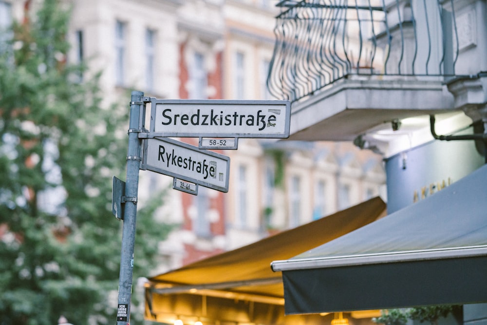 white and black street sign