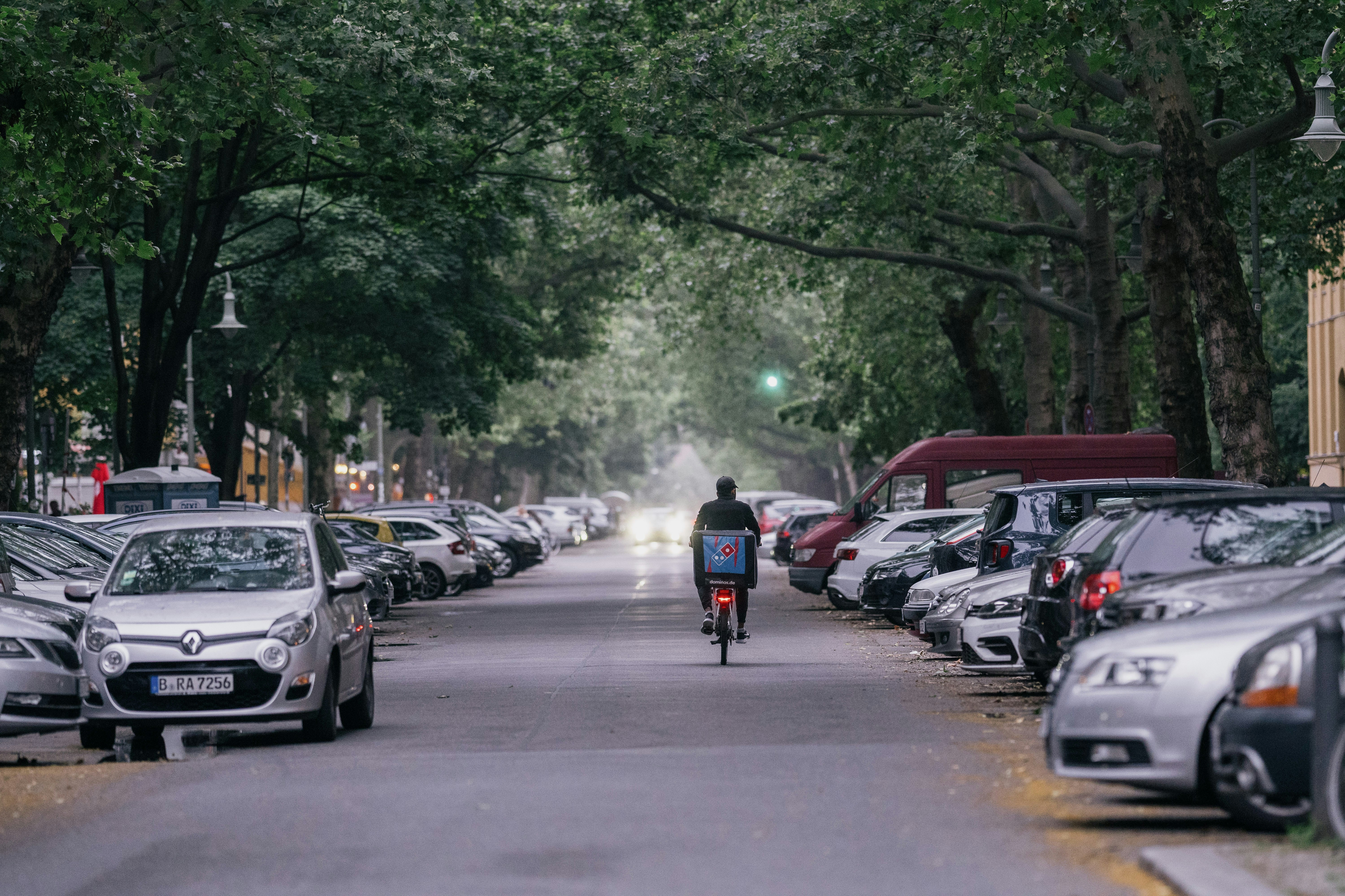 people riding motorcycle on road during daytime