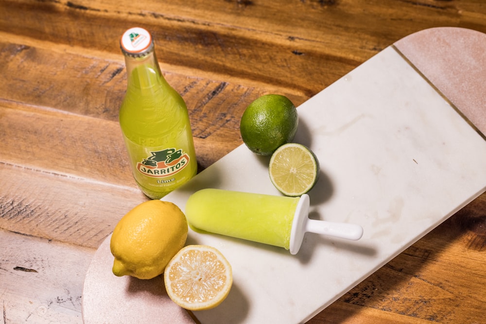 lemon and lime on table