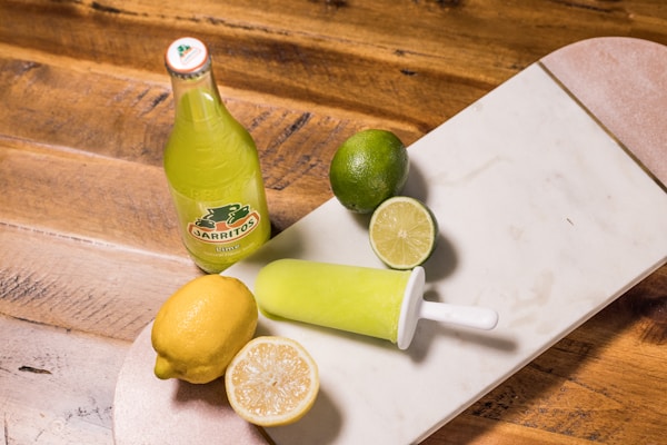 Lemon and lime on table