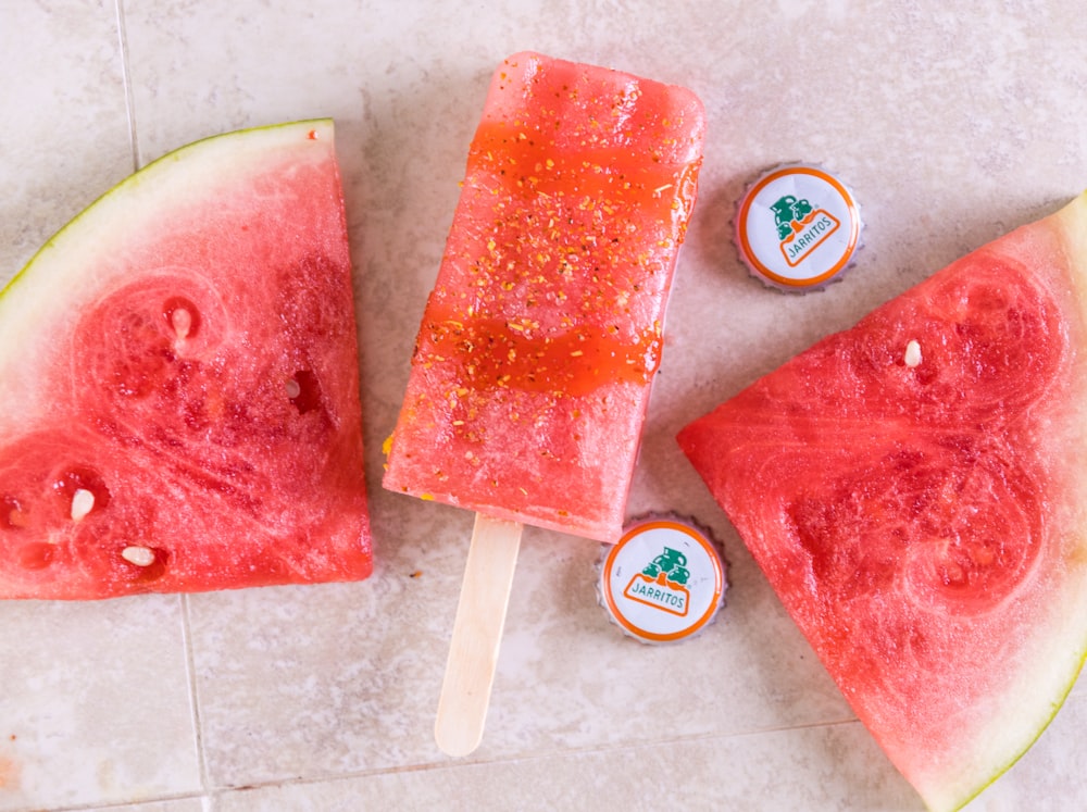 sliced watermelon on white ceramic tile