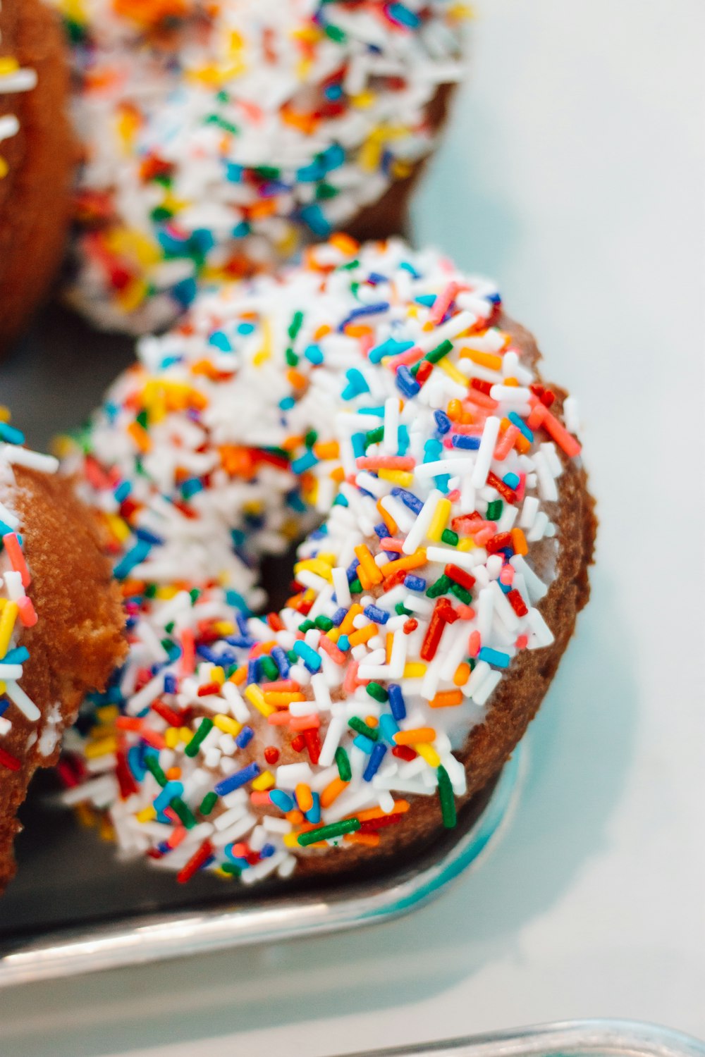 chocolate cake with sprinkles on blue plate