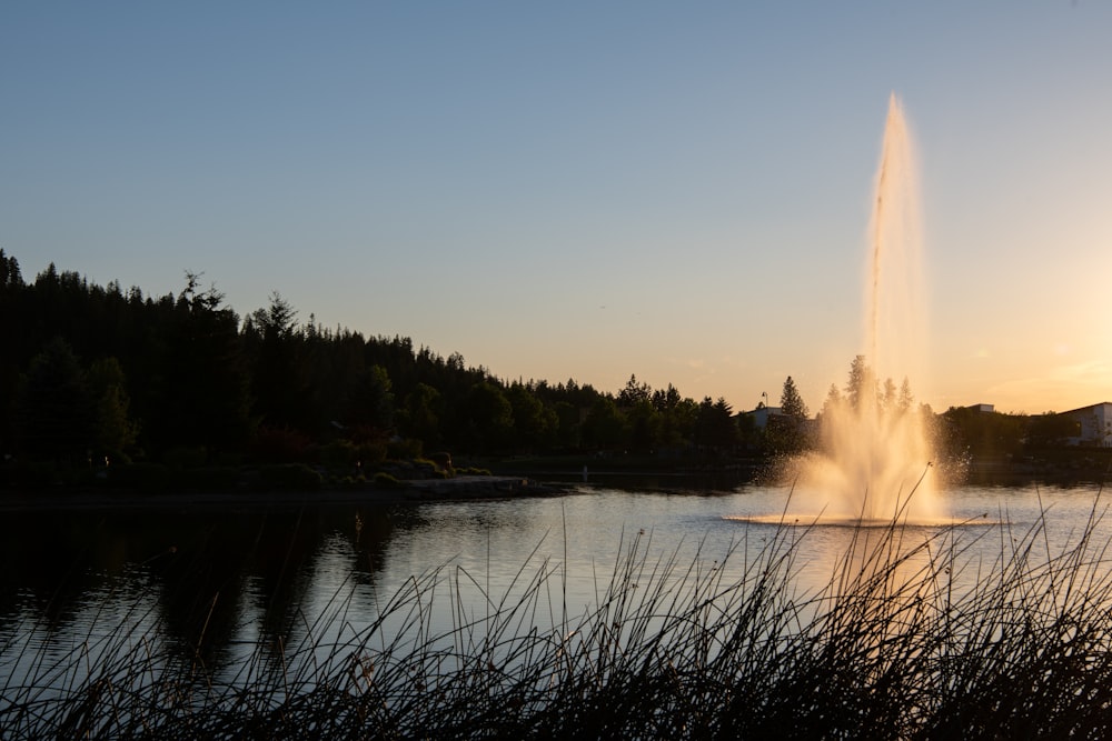 water fountain on lake during daytime