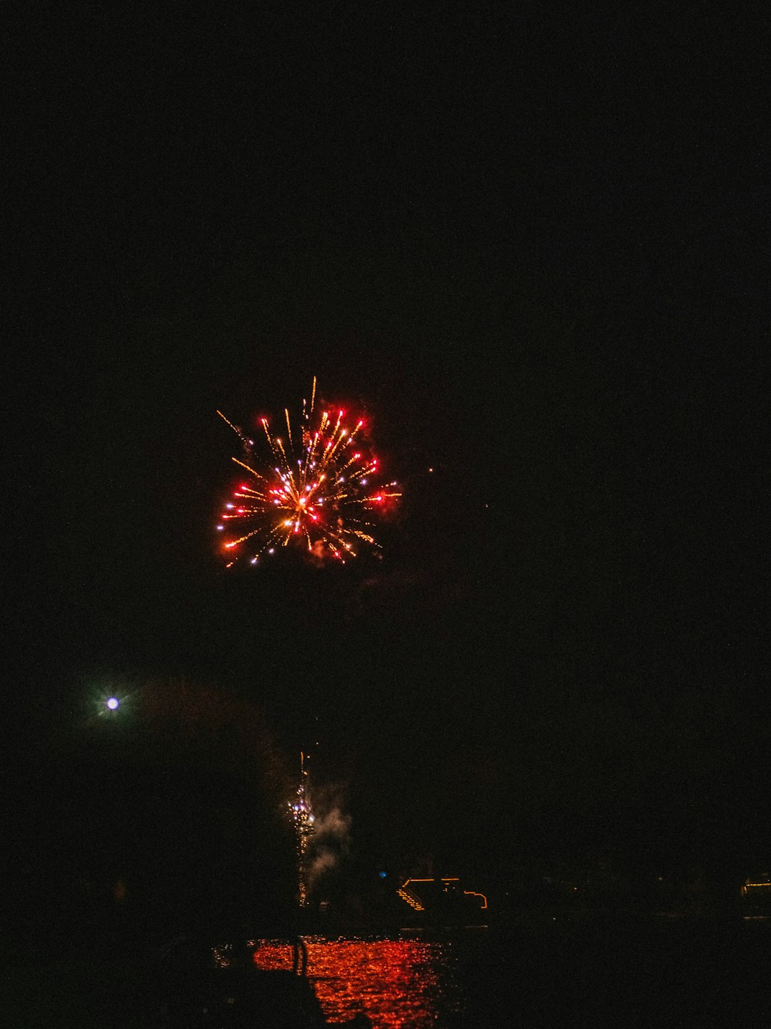 red and yellow fireworks display during night time