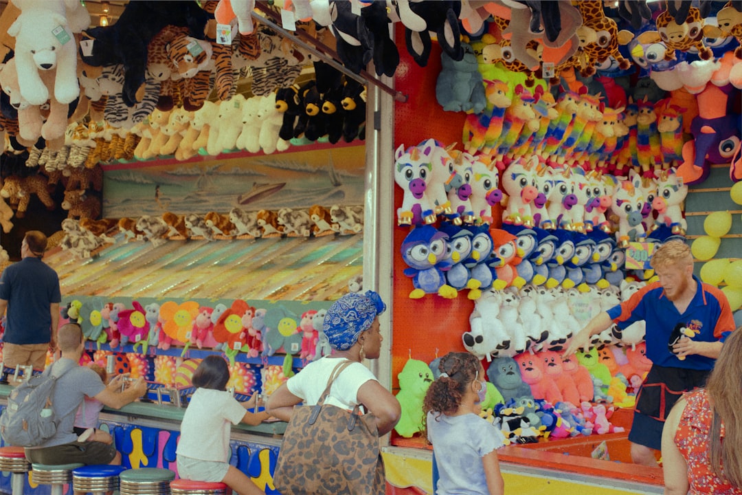 people in a store with assorted balloons