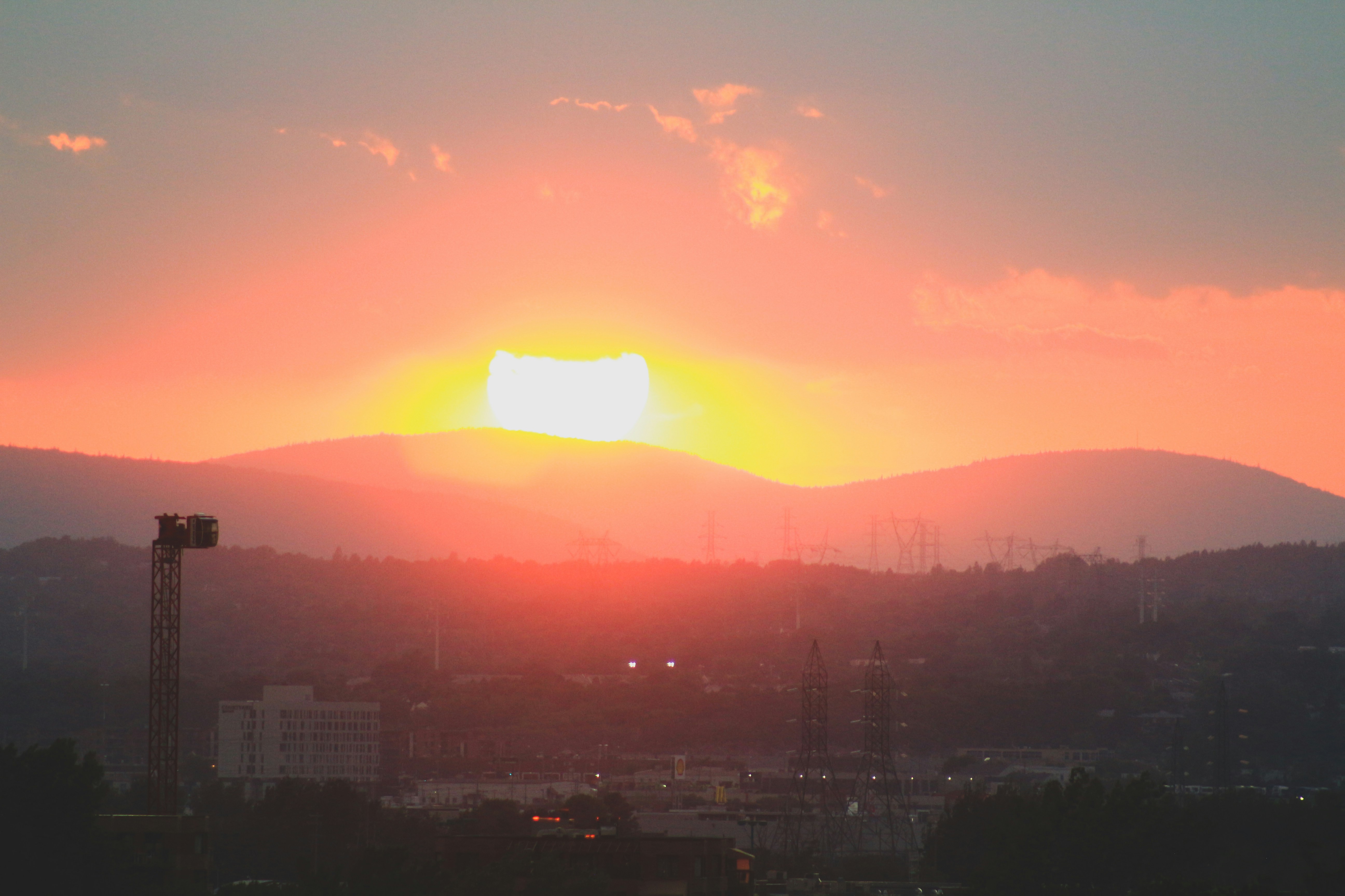 city skyline during orange sunset