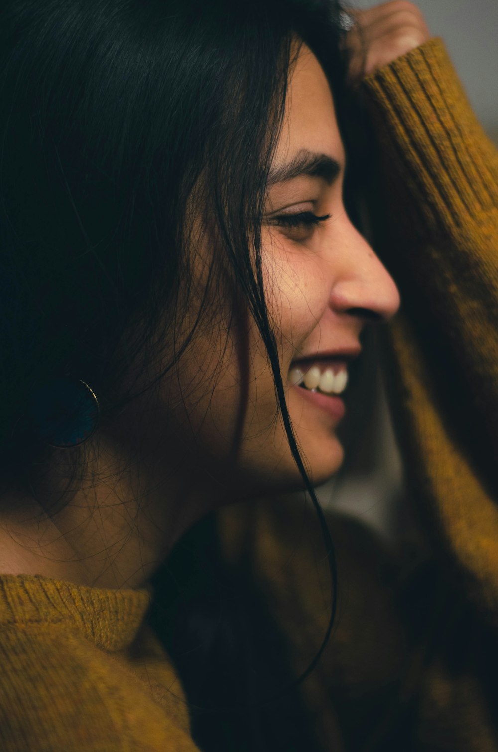 woman in yellow knit sweater