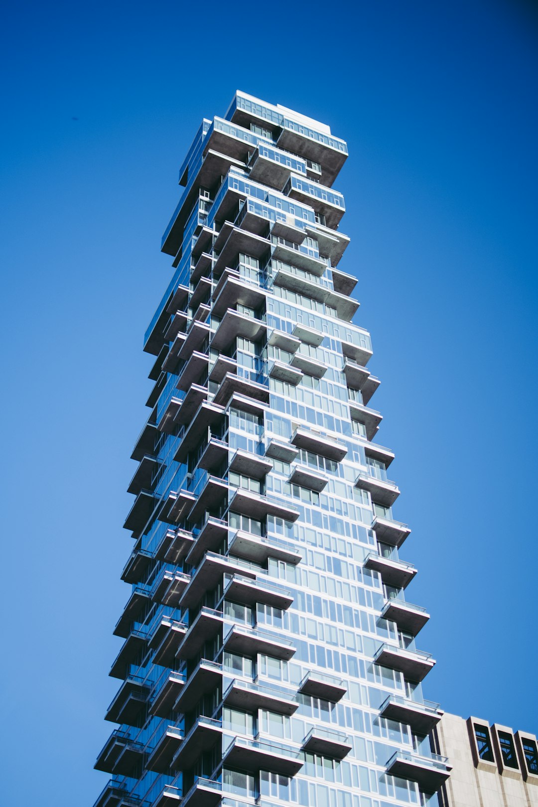 white concrete building under blue sky during daytime