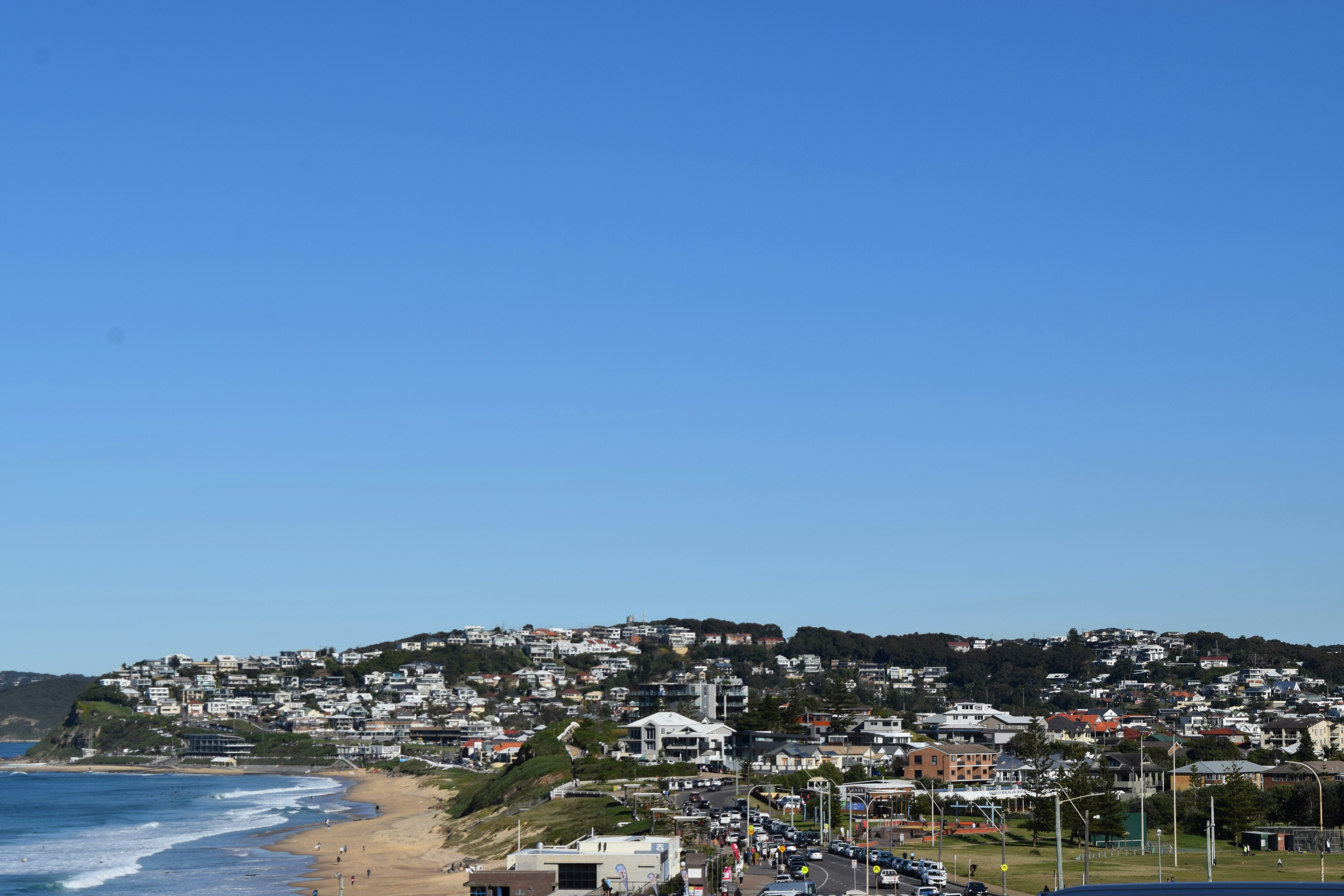 city buildings near body of water during daytime