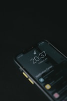 black samsung android smartphone at 10 00