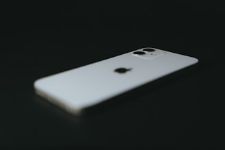 white iphone 5 c on black background