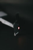 Close-up of a drone's propeller spinning against a dark backdrop.