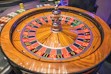 brown and green round analog clock