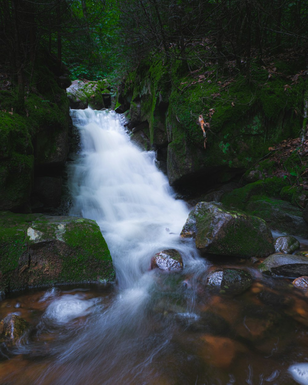 water falls on rocky river