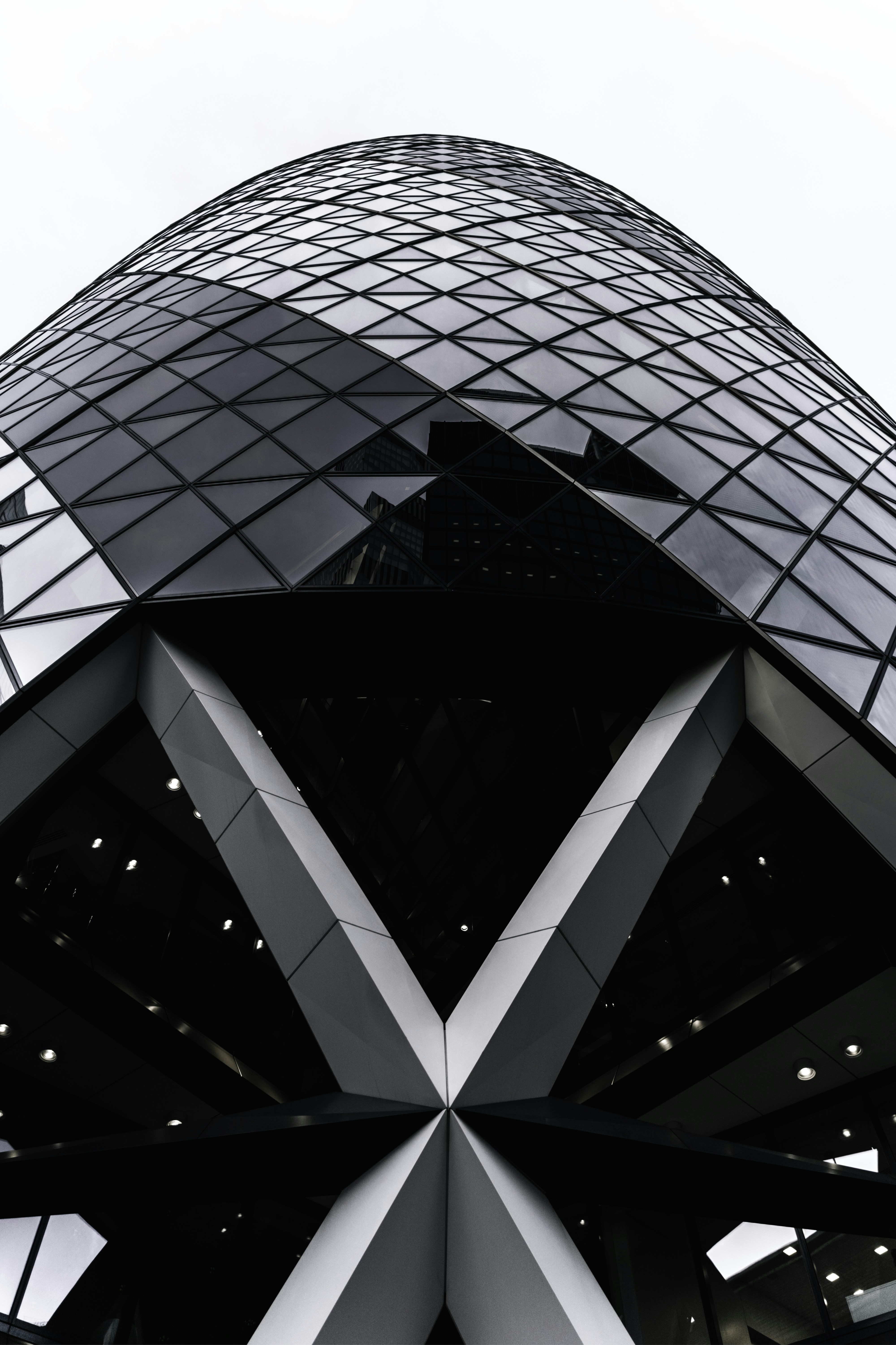 Black and white view of a modern glass office building