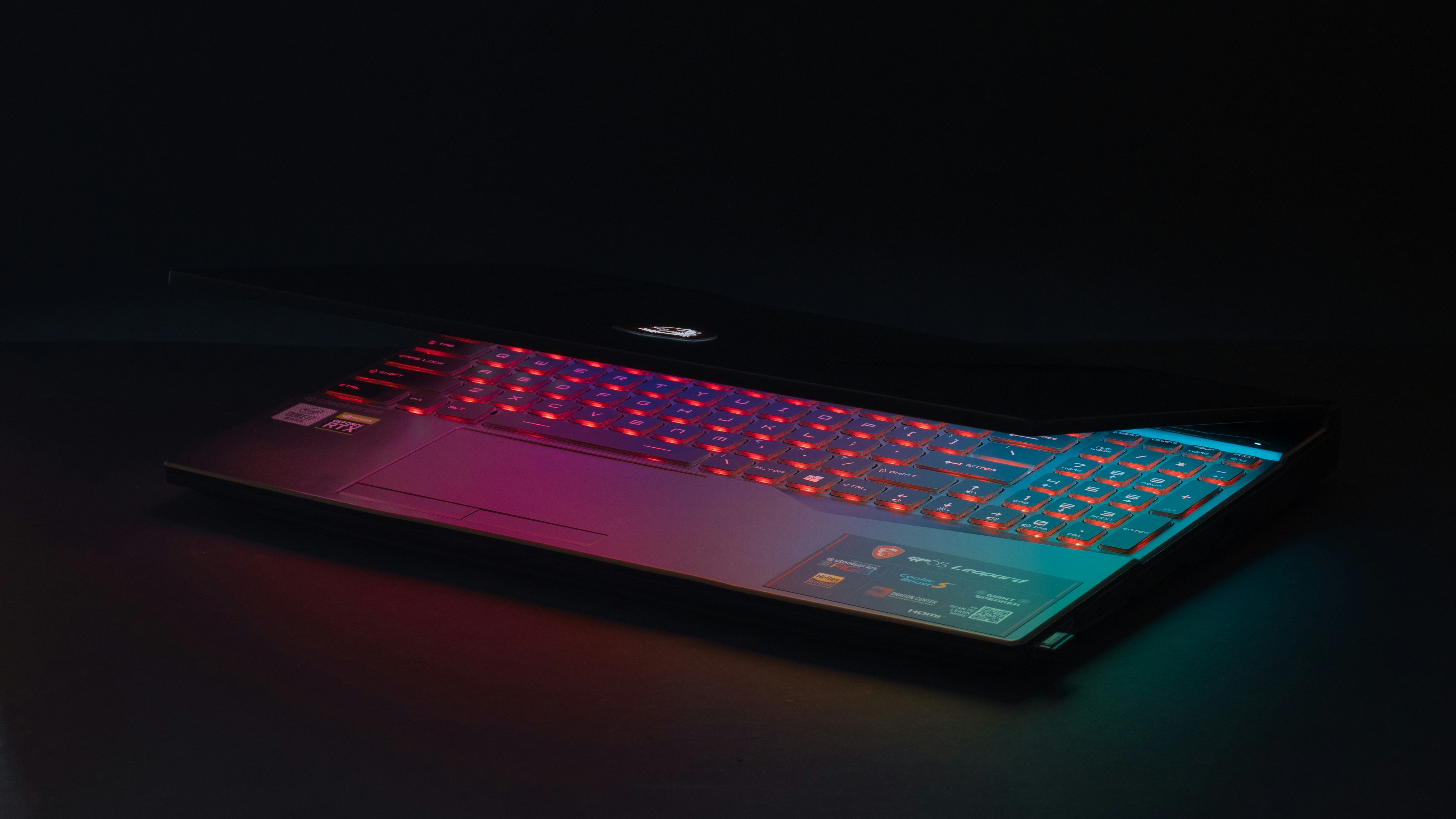 black and blue laptop computer